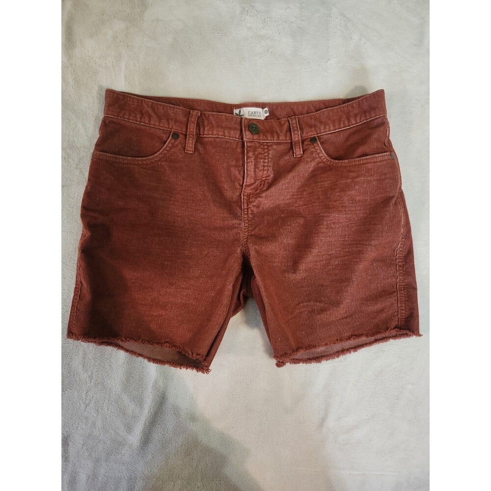 Carve Designs Oahu Short in the Cabernet rust-red colorway, featuring a stretch
